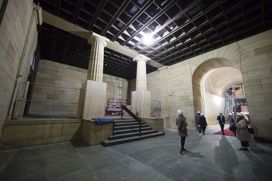 People tour a space under construction after a groundbreaking ceremony for planned renovations of the Philadelphia Museum of Art in Philadelphia, Thursday, March 30, 2017. (AP Photo/Matt Rourke)