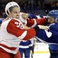 Tampa Bay Lightning defenseman Luke Witkowski, right, and Detroit Red Wings right wing Anthony Mantha (39) fight during the first period of an NHL hockey game Thursday, March 30, 2017, in Tampa, Fla. (AP Photo/Chris O&#39;Meara)