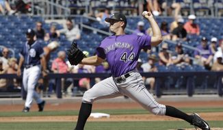 Colorado Rockies&#39; Tyler Anderson throws during the first inning of a spring training baseball game against the San Diego Padres, Thursday, March 30, 2017, in Peoria, Ariz. (AP Photo/Darron Cummings)