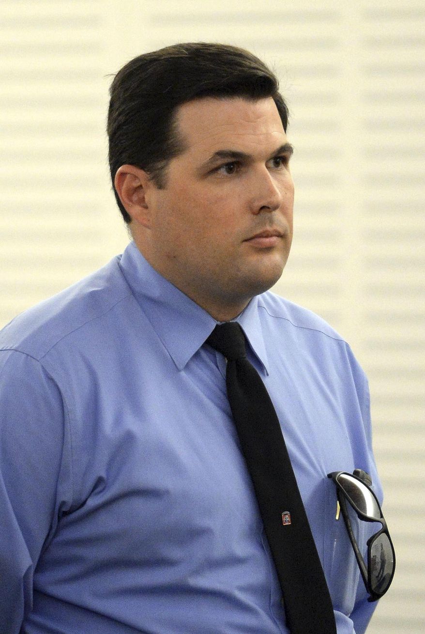 FILE - In this Sept. 8, 2015 file photo, Deputy Charles Foster stands during arraignment in San Bernardino County Superior Court in San Bernardino, Calif. Foster was convicted Thursday, March 30, 2017, in the televised beating of a man who had tried to flee from deputies and escape on horseback. (Micah Escamilla /Los Angeles Daily News via AP, File)