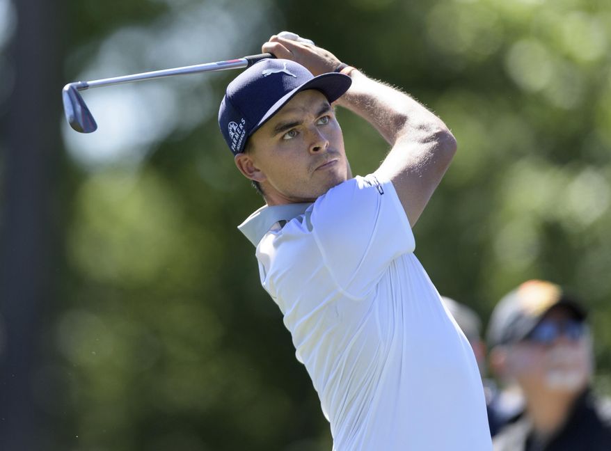 Rickie Fowler hits from the ninth tee during the second round of the Shell Houston Open golf tournament Friday, March 31, 2017, at The Golf Club of Houston in Humble, Texas. (Wilf Thorne/Houston Chronicle via AP)