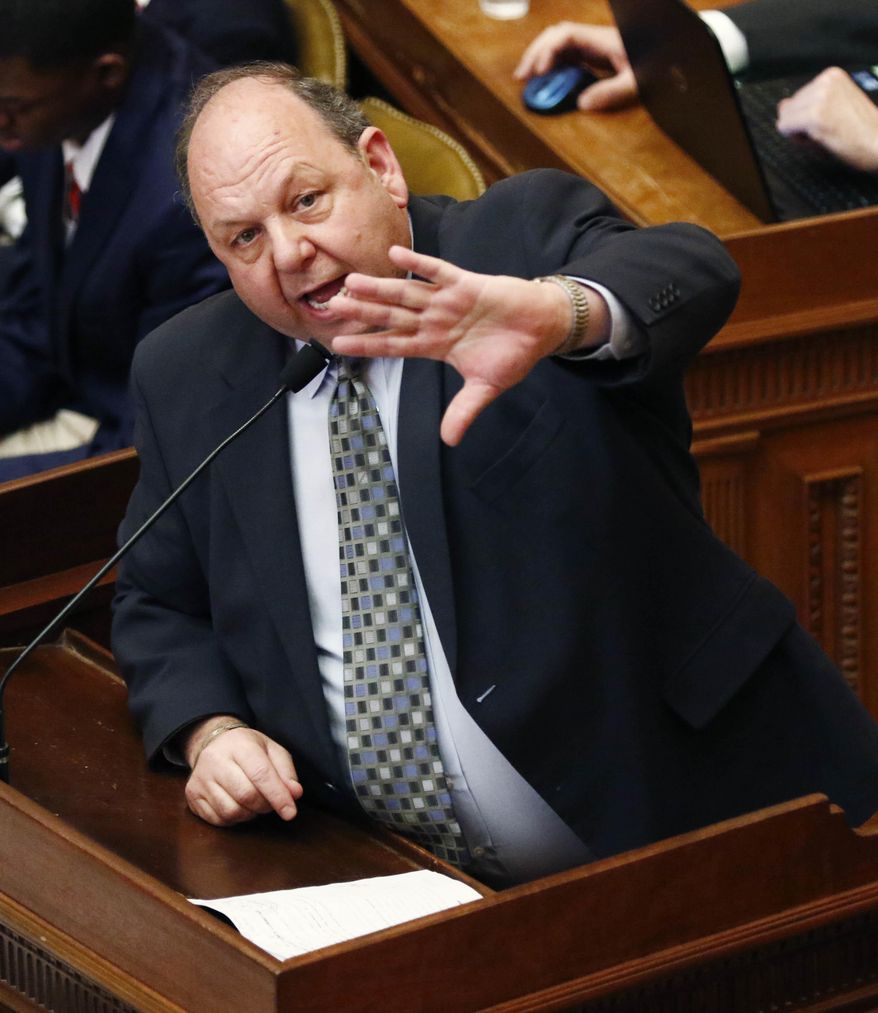 Rep. Steve Holland, D-Plantersville, speaks against consideration of a bill that would restore a privatized Medicaid service program in light of the state's current fiscal situation that might require layoffs of state employees, Tuesday, March 28, 2017, at the Capitol in Jackson, Miss. Lawmakers continue to argue about the unfinished pieces of the state budget for the 2018 fiscal year that begins July 1. (AP Photo/Rogelio V. Solis)