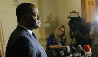Atlanta Mayor Kasim Reed holds a press conference at the Capitol to brief the media on the collapse of an overpass on Interstate 85 in Atlanta on Thursday, March 30, 2017. A massive fire that caused the overpass to collapse in Atlanta was contained as of late Thursday. (Bob Andres/Atlanta Journal-Constitution via AP) ** FILE **