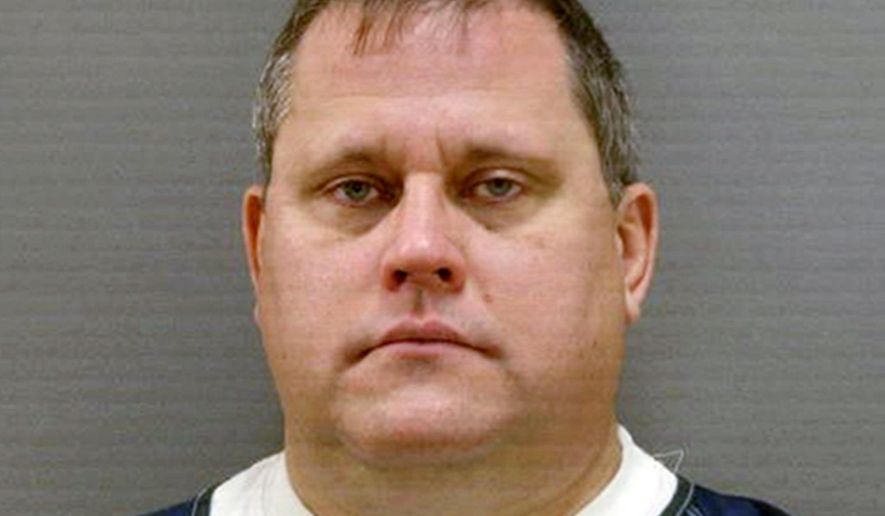 FILE - This undated file provided by the Bureau of Criminal Apprehension in Minnesota shows Timothy Dorway. Authorities have filed more charges against Dorway, a one-time Minnesota high school principal accused of possessing child pornography. He appeared in court Thursday, March 30, 2017, but didn't enter pleas. (Bureau of Criminal Apprehension via AP, File)
