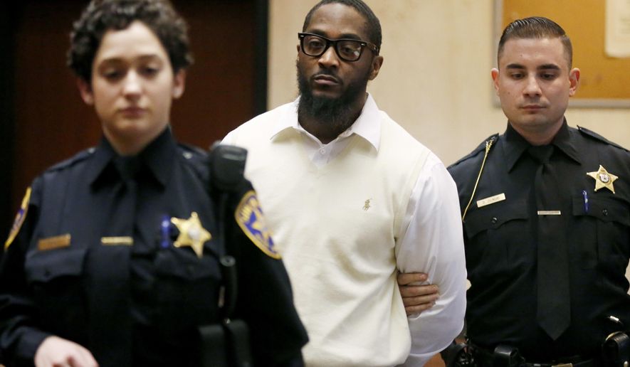 Essex County Sheriff&#x27;s officers lead Basim Henry, one of four men charged with the December 2013 fatal shooting and carjacking of Dustin Friedland at an upscale New Jersey mall, into court where a jury found him guilty on all counts for his role in Friedland&#x27;s murder, Friday, March 31, 2017, in Newark, N.J. (Robert Sciarrino /NJ Advance Media via AP, Pool)