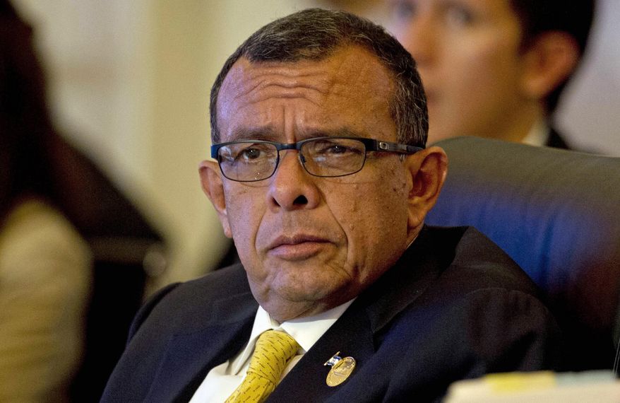 FILE - In this Oct. 19, 2013 file photo, President of Honduras Porfirio “Pepe” Lobo Sosa attends a summit in Panama City. His son Fabio Porfirio Lobo is preparing to go before a federal judge in a lower Manhattan courtroom for sentencing after he pleaded guilty for his role in a drug trafficking ring involving members of the national police. The case is seeming to confirm long held suspicions that corruption at the highest levels of government helped turn the Central American country into a violent epicenter of the drug trade at the start of this decade. (AP Photo/Moises Castillo, File)