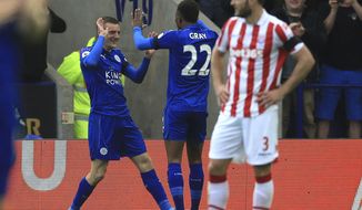 Leicester City&#39;s Jamie Vardy celebrates scoring his sides second goal against Stoke City, during their English Premier League soccer match at the King Power Stadium in Leicester, England, Saturday April 1, 2017. (Nigel French/PA via AP)