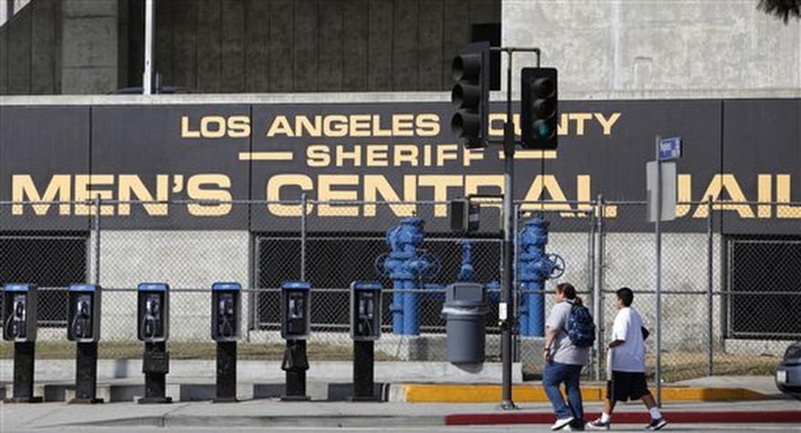 This Wednesday, Sept. 28, 2011 photo shows the Los Angeles County Sheriff's Men's Central Jail facility in Los Angeles. The number of arrests by police in California has plunged in recent years, but that doesn't necessarily represent good news on crime, according to an analysis published Saturday, April 1. The state saw 1.5 million arrests for misdemeanors and felonies in 2015, the most recent year with figures available, according to the Los Angeles Times. (AP Photo/Damian Dovarganes, File)
