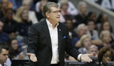 Connecticut head coach Geno Auriemma questions a call during the second half of an NCAA college basketball game against Mississippi State during an NCAA college basketball game in the semifinals of the women&#x27;s Final Four, Friday, March 31, 2017, in Dallas.(AP Photo/LM Otero)