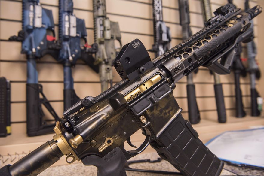 In this photo taken March 15, 2017, an AR-15 style rifle manufactured by Battle Rifle Co. is display in Webster, Texas. Battle Rifle is one of now more than 10,000 gunmakers in the U.S. President Donald Trump promised to revive manufacturing in the U.S., but one sector is poised to shrink under his watch: the gun industry. Fears of limits on guns led to a surge in demand during President Barack Obama’s tenure and manufacturers leapt to keep up. (AP Photo/Lisa Marie Pane)