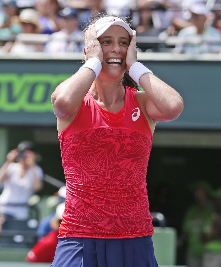 Johanna Konta, of Britain, reacts after defeating Caroline Wozniacki, of Denmark, 6-4, 6-3, in the women&#x27;s singles final tennis match at the Miami Open, Saturday, April 1, 2017 in Key Biscayne, Fla. (AP Photo/Wilfredo Lee)