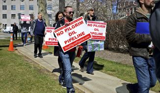 FILE - In this March 29, 2016, file photo, activists and residents from across Bergen County deliver petitions against the proposed Pilgrim Pipeline project in New York and New Jersey In Hackensack, N.J. Prolonged protests in North Dakota failed to stop the flow of oil through the Dakota Access pipeline. But they&#39;ve provided inspiration for protests against pipelines around the country. Tactics used in North Dakota such as resistance camps, social media and online fundraising are now being used against pipeline projects in nearly a dozen states. (Amy Newman/The Record of Bergen County via AP, File)