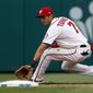 Washington Nationals shortstop Trea Turner fields a ground ball before throwing to first base for the out on Miami Marlins&#39; Derek Dietrich, during the third inning of an opening day baseball game at Nationals Park, Monday, April 3, 2017, in Washington. (AP Photo/Alex Brandon)
