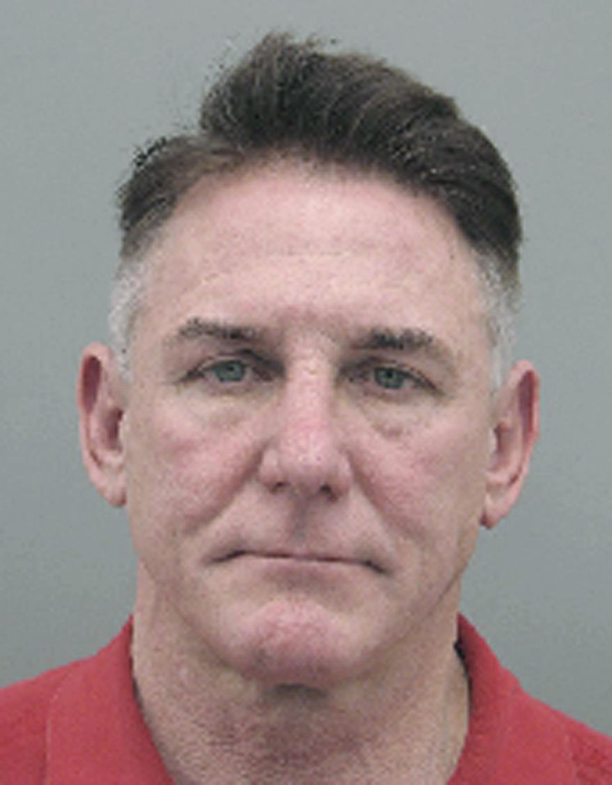 FILE - This undated file booking photo provided by the Henderson Police Department shows Gregory Brent Dennis. Dennis, a Nevada psychologist, has been arrested in the death of his lawyer's wife two years ago. Henderson police said Dennis was arrested Thursday, Feb. 2, following a lengthy investigation. On Monday, April 3, 2017, Clark County Coroner John Fudenberg said that new evidence prompted him to change Susan Winters' cause of death from suicide to "undetermined." (Henderson Police Department via AP)