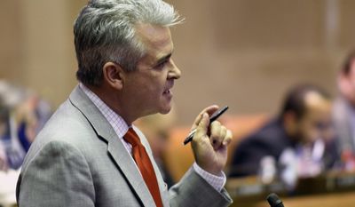 Assemblyman Steve McLaughlin, R-Troy, explains his vote against passing an emergency budget extension in place of the state budget in the Assembly Chamber at the state Capitol on Monday, April 3, 2017, in Albany, N.Y. (AP Photo/Hans Pennink)