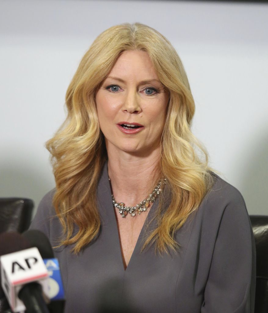 Former Fox News contributor Wendy Walsh appears at a news conference in the Woodland Hills section of Los Angeles on Monday, April 3, 2017.  Walsh says she lost a segment on "The O'Reilly Factor" after she refused to go to host Bill O'Reilly's bedroom following a 2013 dinner in Los Angeles. She's seeking an investigation by New York City's Commission on Human Rights. (AP Photo/Anthony McCartney)