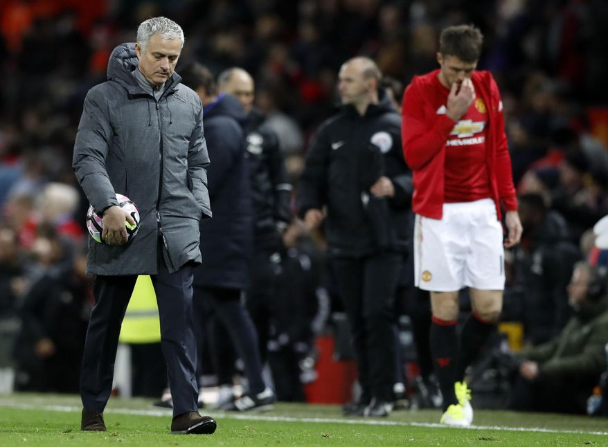 Manchester United manager Jose Mourinho leaves the pitch after the English Premier League soccer match between Manchester United and Everton at Old Trafford in Manchester, England, Tuesday April 4, 2017. Manchester United's Zlatan Ibrahimovic scored from the penalty spot to take the final score to 1-1. (Martin Rickett/PA via AP)