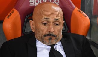 Roma coach Luciano Spalletti sits on the bench during the Italian Cup, return-leg, semifinal match between Roma and Lazio, at the Rome Olympic stadium, Tuesday, April 4, 2017.  (Alessandro Di Meo/ANSA via AP)
