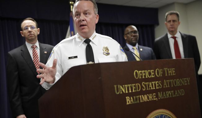 FILE - In this Wednesday, March 1, 2017, file photo, Baltimore Police Department Commissioner Kevin Davis speaks at a news conference in Baltimore to announce that seven Baltimore police officers who worked on a firearms crime task force are facing charges of stealing money, property and narcotics from people over two years. Baltimore Mayor Catherine Pugh and Davis worked closely with Justice Department investigators to scrutinize the city&#x27;s police force and embraced a plan they crafted to overhaul the troubled department. (AP Photo/Patrick Semansky, File)