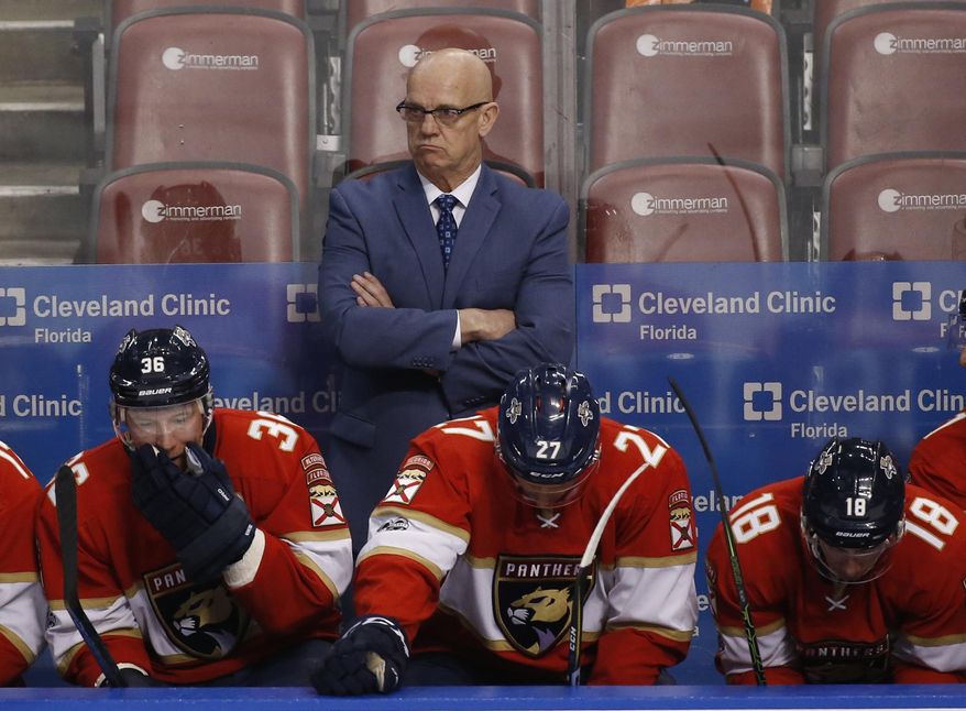 FILE - In this Jan. 31, 2017, file photo, Florida Panthers general manager and interim head coach Tom Rowe looks on during the second period of an NHL hockey game against the Ottawa Senators, in Sunrise, Fla. The Panthers have decided interim coach Tom Rowe's stint will end when their season does Sunday, a person with knowledge of the situation told The Associated Press. Rowe may still stay with the organization, said the person who spoke Tuesday, April 4, 2017, on condition of anonymity because Florida has not revealed any details publicly. (AP Photo/Wilfredo Lee, File)