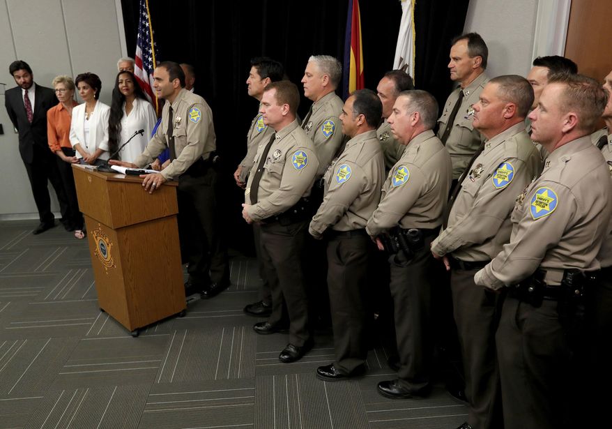 Maricopa County Sheriff Paul Penzone speaks at a news conference, Tuesday, April 4, 2017, in Phoenix. Penzone says he's shutting down a complex of jail tents that helped make his predecessor Joe Arpaio a national law enforcement figure. The nearly 24-year-old Tent City complex has drawn criticism for contributing to a culture of cruelty within jails in Arizona's most populous county. (AP Photo/Matt York)