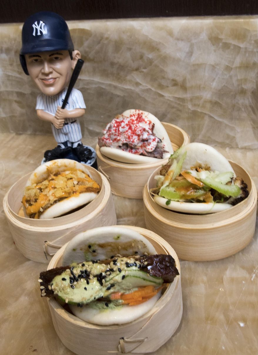 Traditional Chinese Bao, served at the Toyota Terrace are displayed during a media tour of Yankee stadium, Tuesday, April 4, 2017, in New York. The New York Yankees home-opener at the ballpark is scheduled for Monday, April 10, 2017, against the Tampa Bay Rays. (AP Photo/Mary Altaffer)