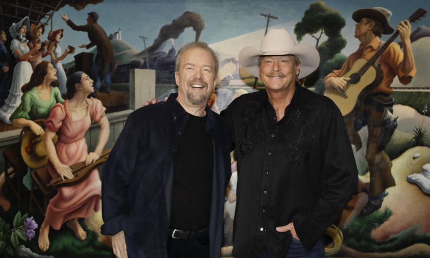 Songwriter Don Schlitz, left, and singer and songwriter Alan Jackson pose after it was announced Wednesday, April 5, 2017, in Nashville, Tenn., that they are the 2017 inductees into the Country Music Hall of Fame along with the late singer and songwriter Jerry Reed. (AP Photo/Mark Humphrey)