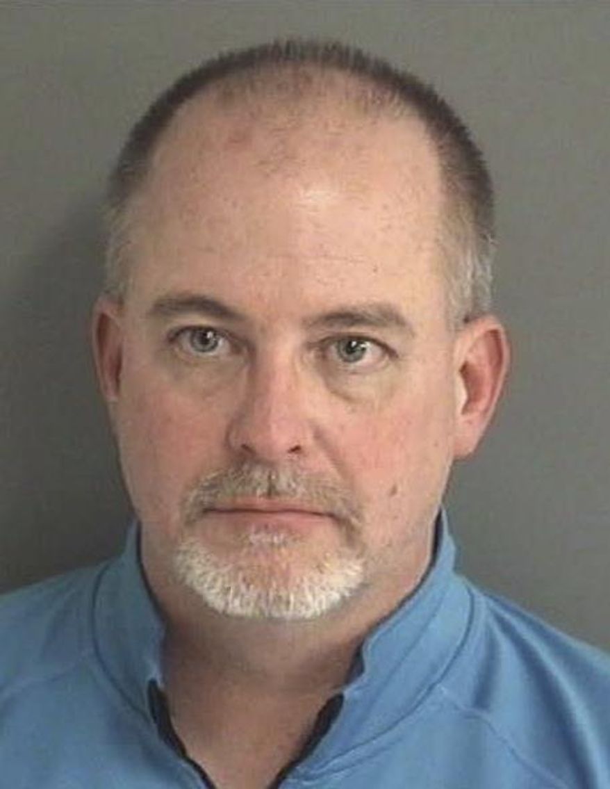 FILE - This Jan. 24, 2017, file photo provided by the Story County Sheriff's Office in Ames, Iowa, shows John McPhee. McPhee, a former Iowa fire academy administrator could avoid jail time after falsifying test scores that were used to improperly certify hundreds of firefighters. McPhee has agreed to plead guilty to misconduct in office at a hearing set for April 26. (Story County Sheriff's Office via AP, File)