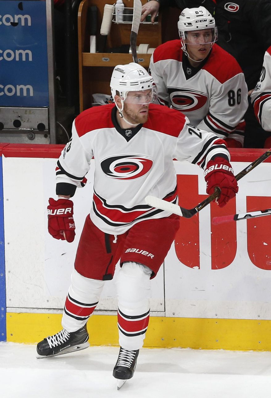 Carolina Hurricanes' Bryan Bickell takes a shift in the first period of an NHL hockey game against the Minnesota Wild Tuesday, April 4, 2017, in St. Paul, Minn. Bickell has rejoined the Hurricanes for the last few games of the regular season, five months after his diagnosis of multiple sclerosis forced a hiatus from the team and raised questions about his future in the sport. (AP Photo/Jim Mone)