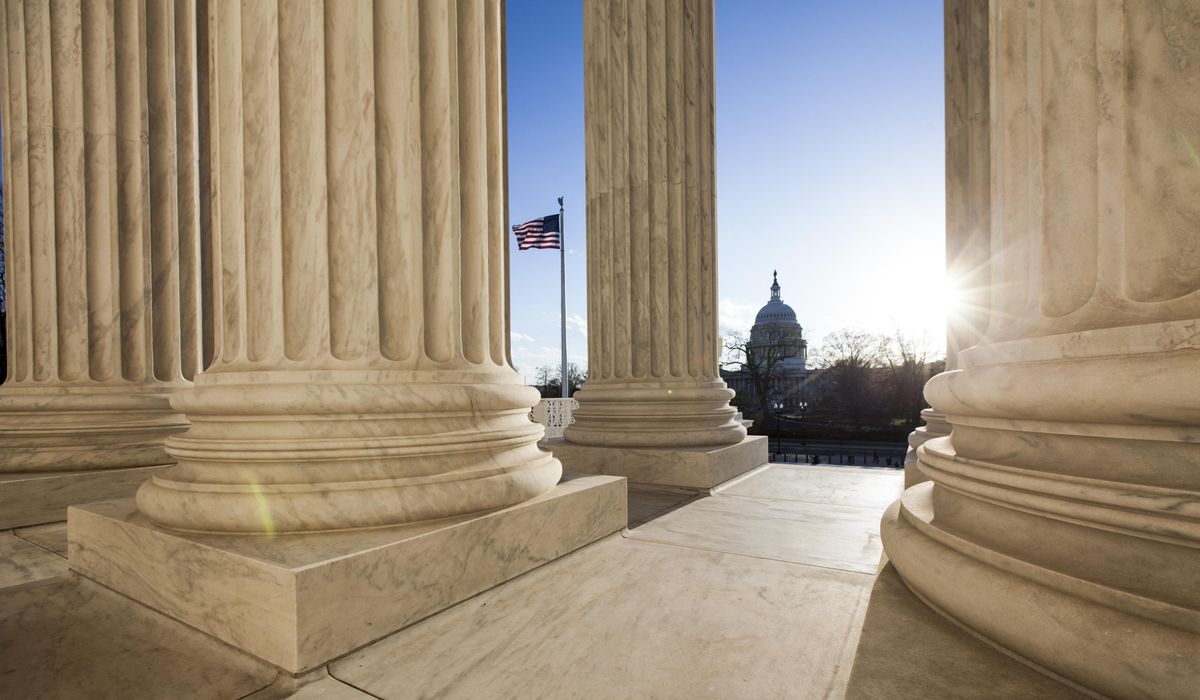 NextImg:Gallup poll finds record partisan gulf in approval ratings for Congress, Supreme Court