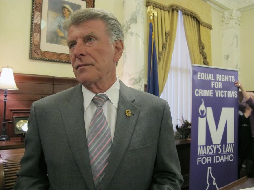 Idaho Gov. C.L. "Butch" Otter pauses after signing a proclamation dedicating April 2 through April 8 "Crime Victims' Rights Week" in Boise, Idaho Thursday, April 6, 2017. Senate Majority Caucus Chair Todd Lakey said Thursday he will bring back his proposal during the 2018 legislative session after his first version was spiked by a House committee earlier this year. The proposal would have required that crime victims be notified of all court proceedings and be heard at each step along the way. It also would have declared that full and timely restitution is a right. (AP Photo/Kimberlee Kruesi)