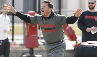 FILE - In this March 4, 2017, file photo, Bob Diaco works with players on the first day of NCAA college football spring practice, in Lincoln, Neb. Diaco is always moving. There’s no time to waste for Nebraska&#39;s new defensive coordinator. (AP Photo/Nati Harnik, FIle)