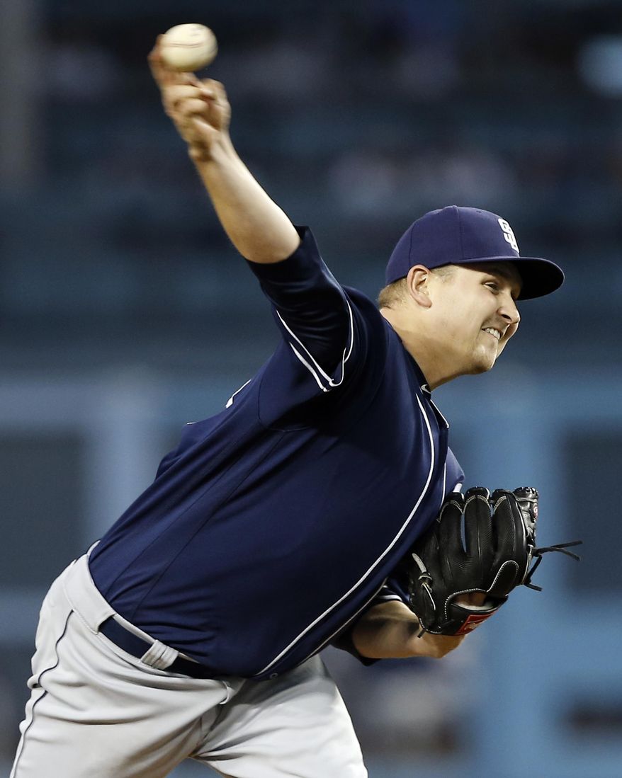 San Diego Padres starting pitcher Trevor Cahill throws to a Los Angeles Dodgers batter during the first inning of a baseball game in Los Angeles, Wednesday, April 5, 2017. (AP Photo/Alex Gallardo)
