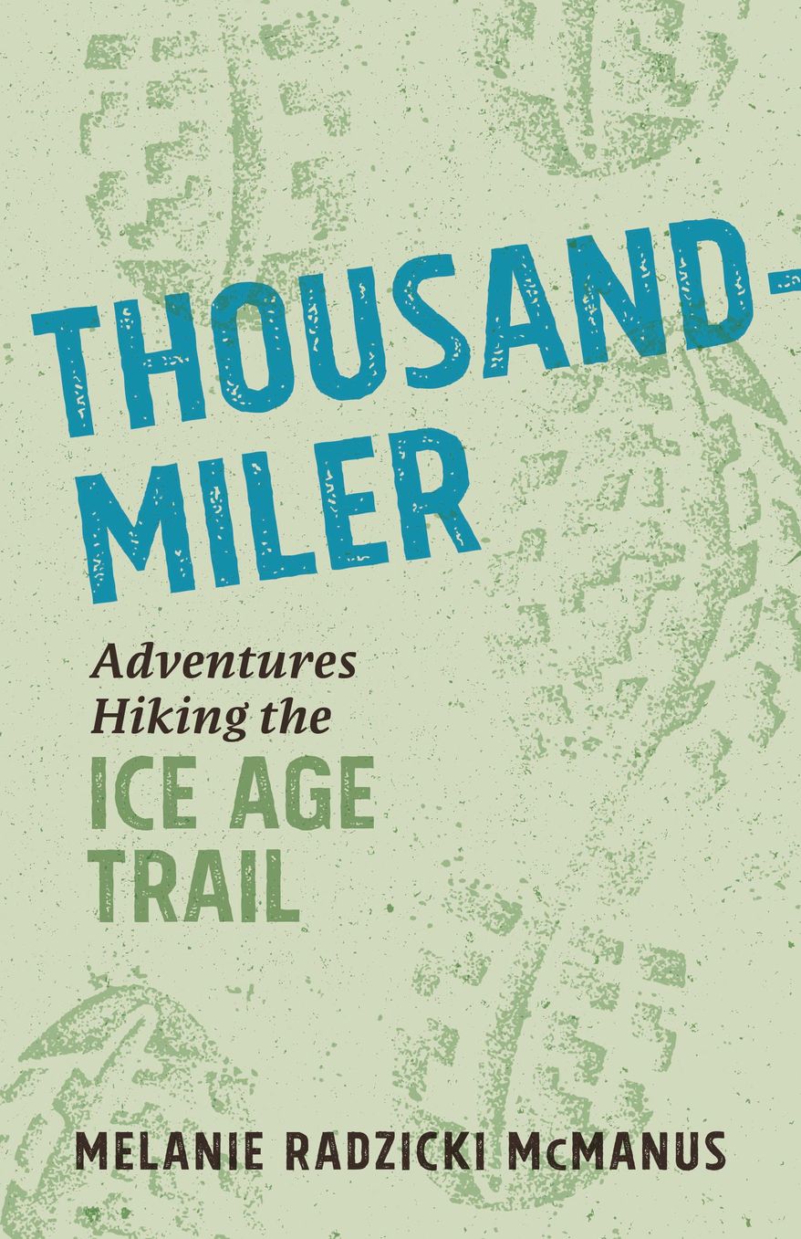 This image shows the cover of "Thousand-Miler: Adventures Hiking the Ice Age Trail." The new book by Melanie McManus documents the experiences she and others have had hiking Wisconsin's 1,100-mile Ice Age Trail. McManus completed the trail in 36 days in 2013 and 34 days in 2015. (Wisconsin Historical Society Press via AP)
