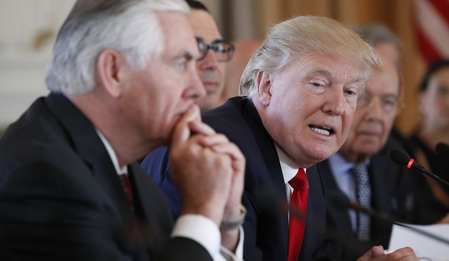 President Donald Trump, joined by Secretary of State Rex Tillerson, left, speaks during a bilateral meeting with Chinese President Xi Jinping at Mar-a-Lago, Friday, April 7, 2017, in Palm Beach, Fla. Mr. Trump was meeting again with his Chinese counterpart Friday, with U.S. missile strikes on Syria adding weight to his threat to act unilaterally against the nuclear weapons program of China&#x27;s ally, North Korea. (AP Photo/Alex Brandon)