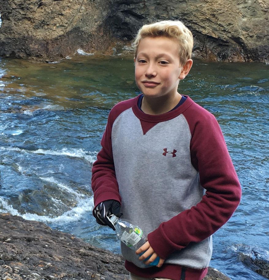 This undated family photo provided by Katrina Gross shows her son Tysen Benz. Benz, an 11-year-old Michigan boy hanged himself in his room after seeing social media posts indicating that his girlfriend had committed suicide. The posts turned out to be a prank. Now the boy's mother, Katrina Goss, says school officials should have done more to prevent his death. Goss says the girlfriend attended the same school as Tysen. He died Tuesday, April 4, 2017, at a Detroit hospital. (Katrina Gross via AP)