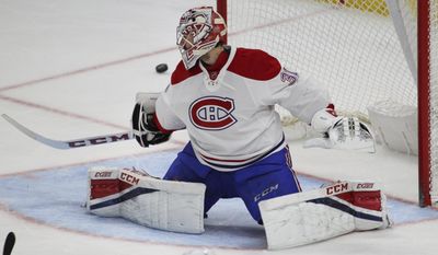Montreal Canadiens goalie Carey Price (31) deflects the puck into the Corner during the third period of an NHL hockey game against the Buffalo Sabres, Wednesday, April 5, 2017, in Buffalo, N.Y. (AP Photo/Jeffrey T. Barnes)
