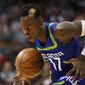 Atlanta Hawks guard Dennis Schroder (17) drives tot he basket in the second half of an NBA basketball game against the Boston Celtics on Thursday, April 6, 2017, in Atlanta. The Hawks won the game 123-116. (AP Photo/Todd Kirkland)