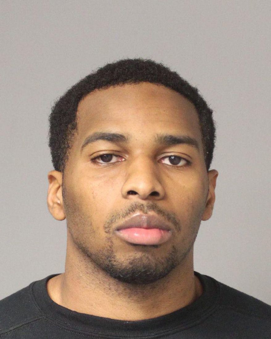 This undated booking photo shows Chukwuemeka Ekwonna. The Washington police officer is facing a string of charges in Maryland after authorities say he paid a 15-year-old girl for sex, then took back the money at gunpoint. Anne Arundel County police said 27-year-old Ekwonna of Glenn Dale was arrested Thursday, April 6, 2017, and charged with armed robbery, assault, third-degree sex offense, reckless endangerment, prostitution and a weapon offense. ( Anne Arundel County Police Department via AP)