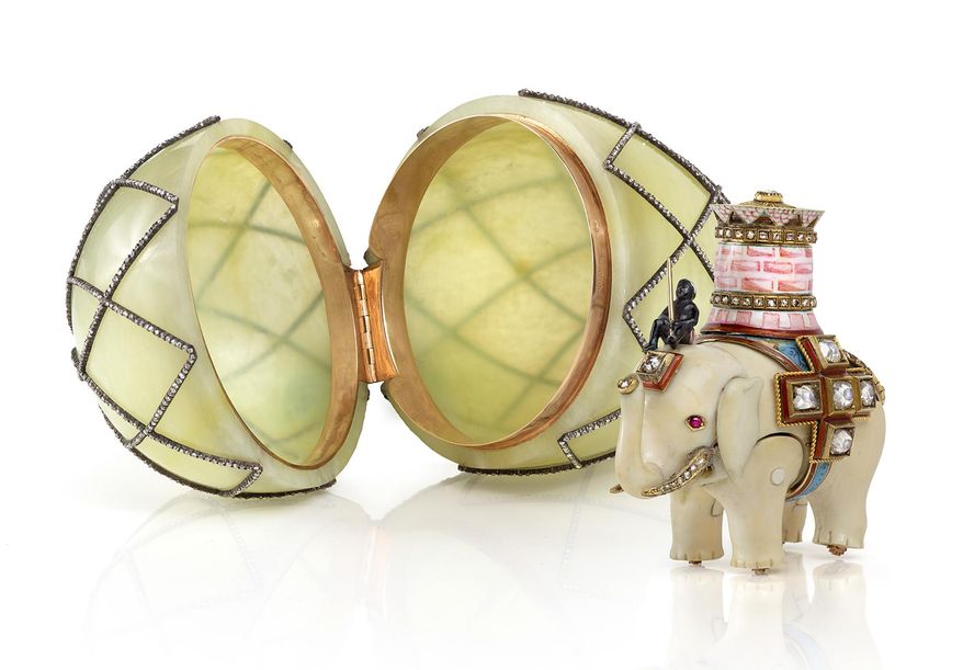 This undated photo provided by the Houston Museum of Natural Sciences shows a Faberge egg and a jeweled elephant designed to fit inside it. The two items will be reunited for the first time in almost a century thanks to a loan from Queen Elizabeth II to the museum. The exhibit opening Monday, April 10, 2017, features the elephant that was only in recent years discovered to have been the egg's missing "surprise. (Houston Museum of Natural Sciences via AP)