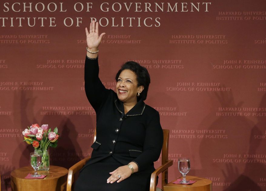 Former U.S. Attorney General Loretta Lynch, the nation's first black woman to head the Justice Department, waves as she arrives to speak at a conference on policy and blacks at Harvard University's Kennedy School of Government, Friday, April 7, 2017, in Cambridge, Mass. The 57-year-old North Carolina native graduated from Harvard College in 1981 and from Harvard Law School in 1984. (AP Photo/Elise Amendola)