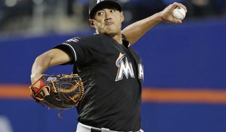 Miami Marlins starting pitcher Wei-Yin Chen throws during the first inning of the team&#39;s baseball game against the New York Mets on Friday, April 7, 2017, in New York. (AP Photo/Frank Franklin II)