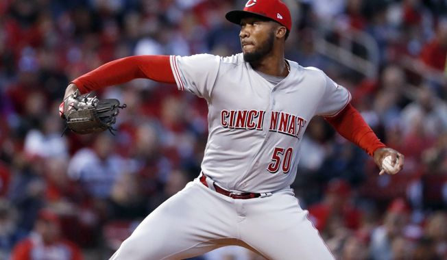 Cincinnati Reds starting pitcher Amir Garrett throws during the first inning of the team&#x27;s baseball game against the St. Louis Cardinals Friday, April 7, 2017, in St. Louis. (AP Photo/Jeff Roberson)