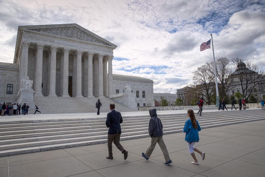 Visitors arrive at the Supreme Court as the Senate votes to confirm President Donald Trump's high court nominee Neil Gorsuch, on Capitol Hill in Washington, Friday, April 7, 2017. (AP Photo/J. Scott Applewhite)