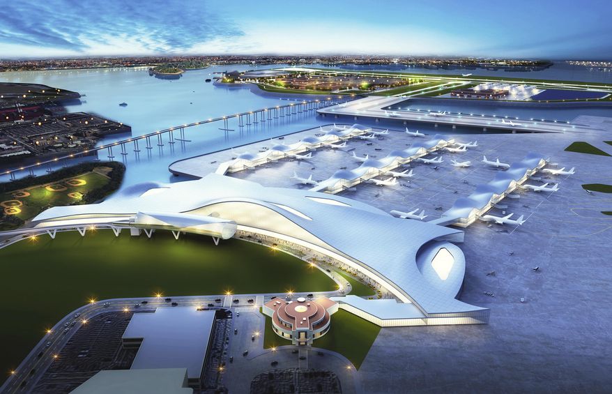 This artist rendering provided by FXFOWLE Architects shows the historic Marine Air Terminal Building, foreground, at New York's LaGuardia Airport, and a proposed plan for connecting it to a new airport runway and terminal, center top on that would be built on the island that now houses the city's massive Rikers Island jail complex. A commission urging the city to close the jail complex proposed reusing the space to expand the airport, which last year had by far the highest rate of late-arriving flights of any of the nation's 29 biggest airports. (FXFOWLE Architects via AP)