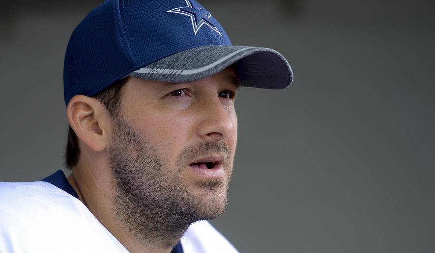 FILE - In this Aug. 1, 2016, file photo, Dallas Cowboys quarterback Tony Romo takes to reporters at the end of practice in Oxnard, Calif.  Two people with knowledge of the plan say Romo will be an honorary Dallas Mavericks player for their home finale, wearing his football No. 9 while sitting on the bench. Romo can be added to the Mavericks’ roster for a day because of an open spot, one of the people told The Associated Press on Saturday, April 8, 2017.  (AP Photo/Gus Ruelas, File)