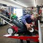 Gary Taylor, an employee of Brodd&#39;s Small Engine Repair in Lincoln, Nebraska, works on a lawn mower. Tim Brodd, the shop&#39;s owner, prefers fuel without ethanol if it&#39;s available. (Associated Press)