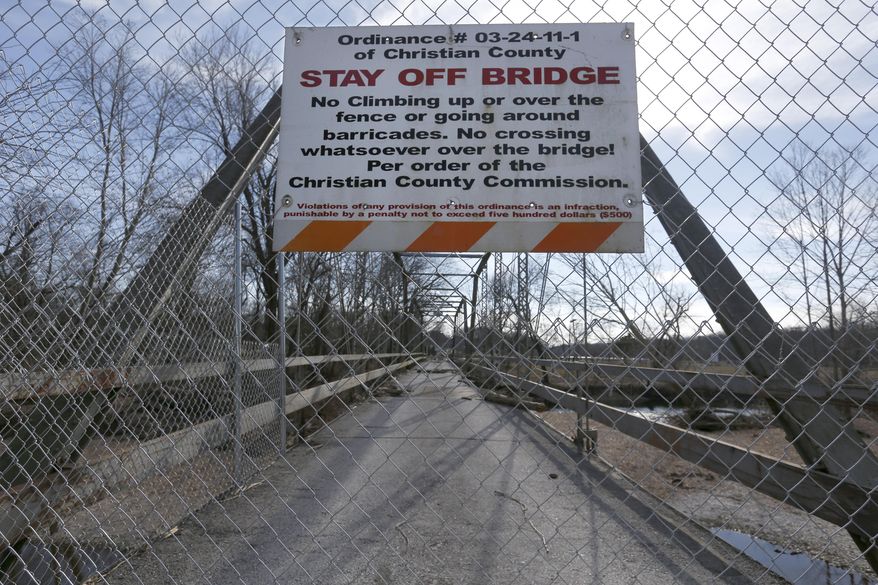 This Feb. 5, 2017 file photo shows the Riverside Bridge in Ozark, Mo. The century-old bridge has been closed since July 2015 because of damage from flooding. (Andrew Jansen/The Springfield News-Leader via AP)