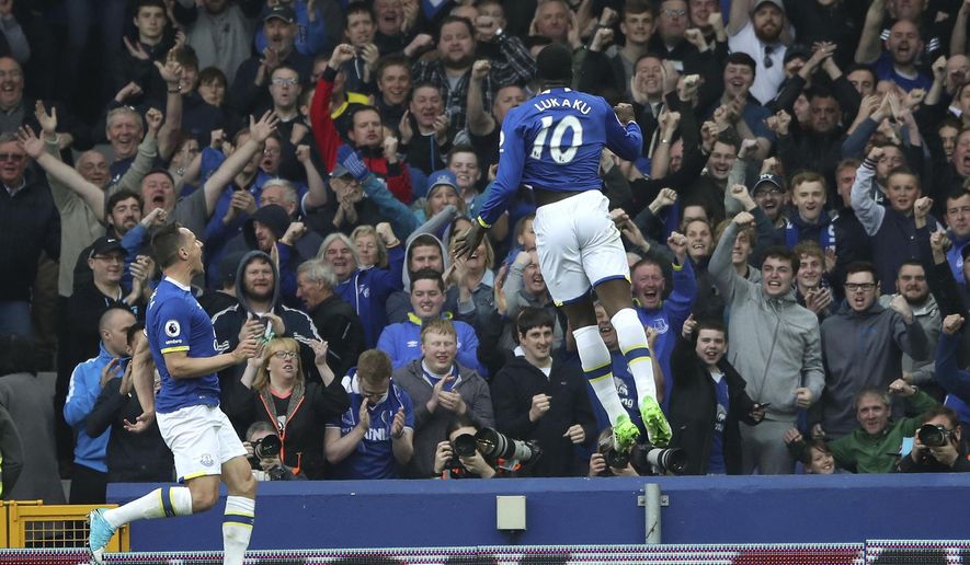 Everton&#x27;s Romelu Lukaku, right, celebrates with fans after scoring his side&#x27;s fourth goal of the game against Leicester City during their English Premier League soccer match at Goodison Park in Liverpool, England, Sunday April 9, 2017.  (Nick Potts/PA via AP)