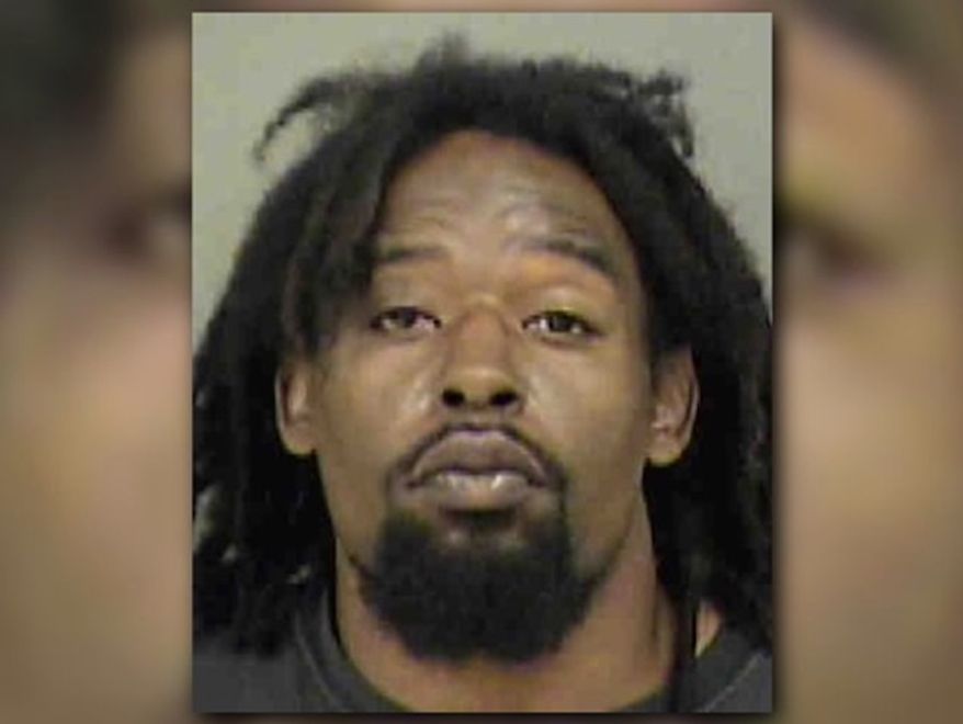 Curtis Flournoy, 32, was charged by Charlotte-Mecklenburg Police Sunday for allegedly setting a fire at an immigrant-owned grocery store and leaving behind a pro-Donald Trump note signed "White America." (Mecklenburg County Jail)
